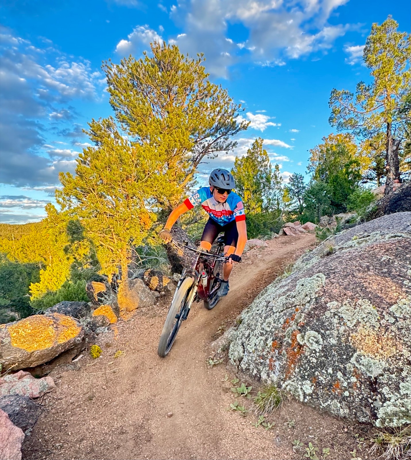 Mountain biker riding a rocky trail